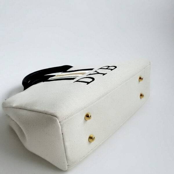 <span style="font-family:Bodoni Moda;">NORA</span><br>Canvas - Image 4