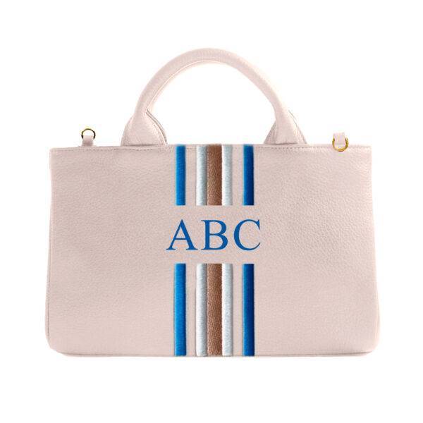 <span style="font-family:Bodoni Moda;">NORA</span><br><span style="color:#d3b28d;">Sand Raya Samui</span>